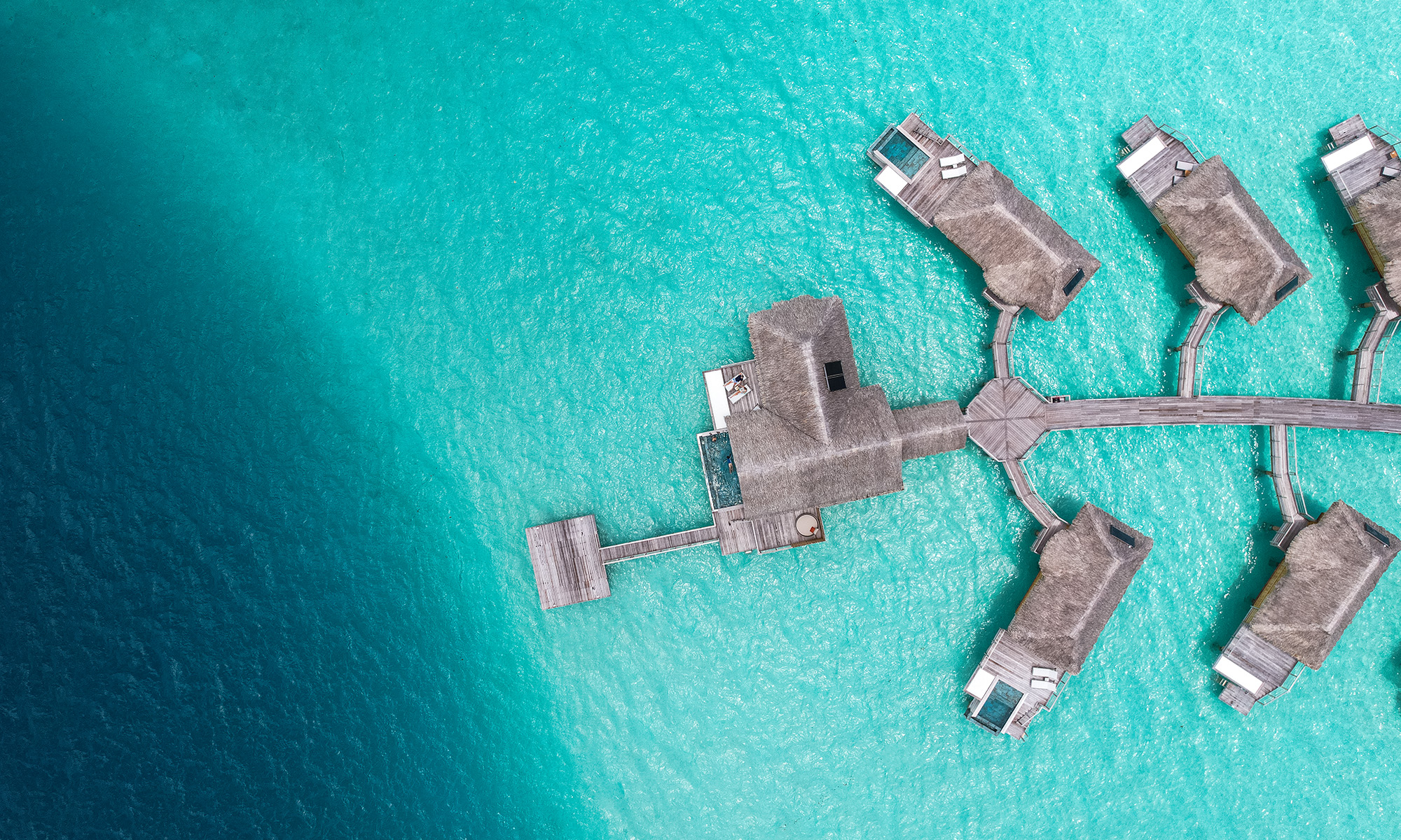 Le Bora Bora by Pearl Resorts' ikoniske overwater bungalows | © Grégoire Le Bacon